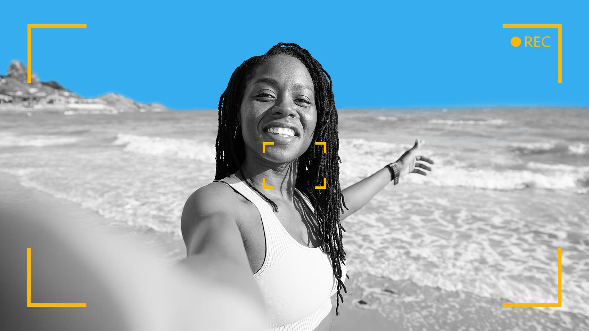 This image features a person taking a selfie on the beach. You are looking at the image from the perspective of the camera. This image represents inspiration for your summer video marketing campaigns.