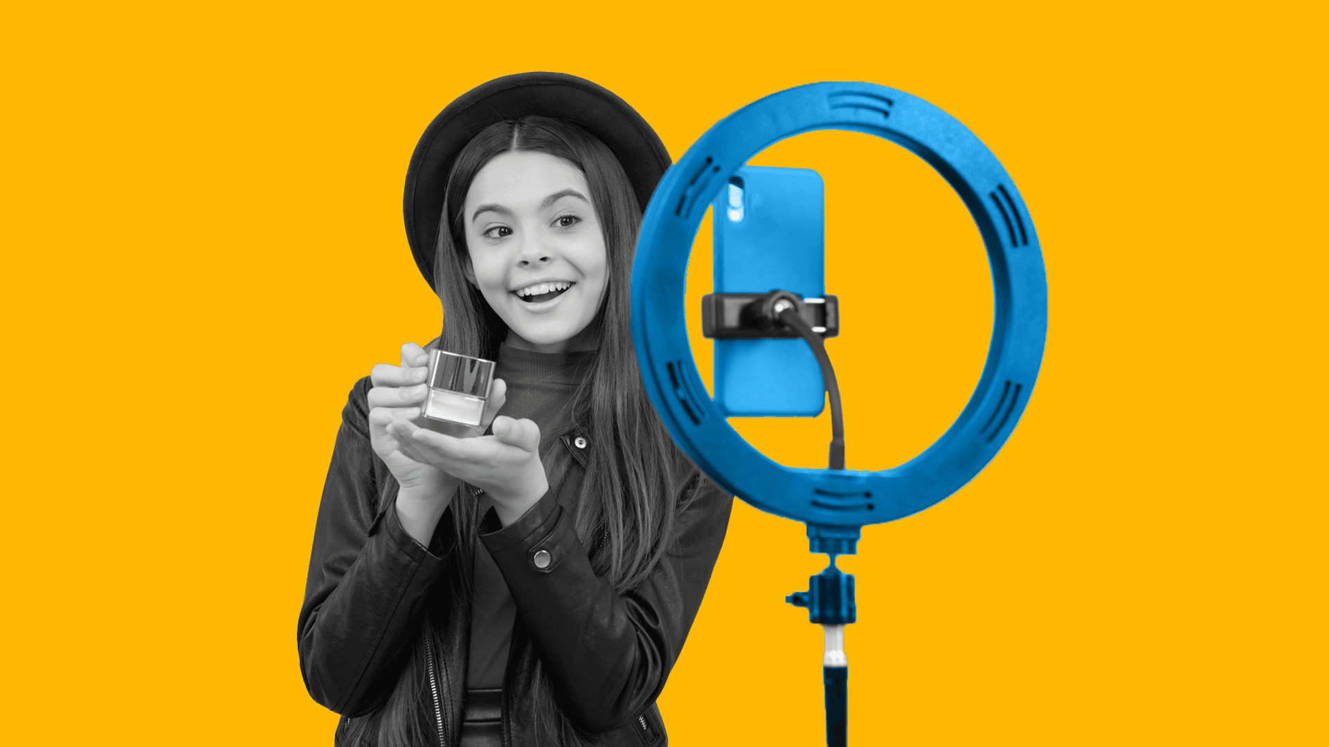 This image is a person recording themselves with an iPhone and a ring light. This photo is meant to represent creative best practices to help brands reach Millennial audiences.