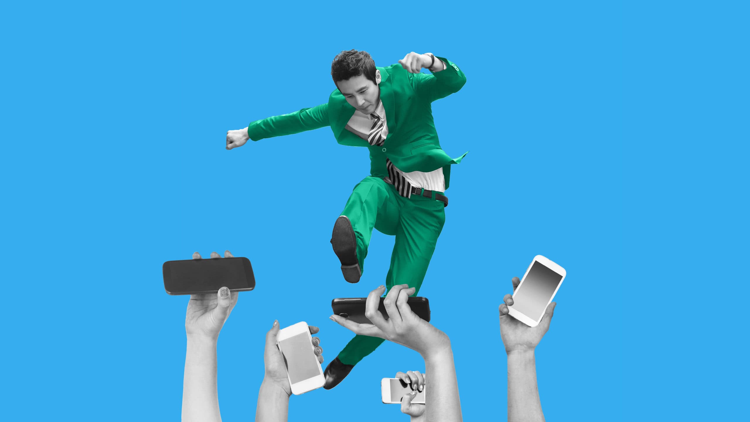 This image features a person jumping, wearing a green suit. In front of them, there are arms holding up cell phones. This image is meant to represent overcoming social media challenges in 2023.