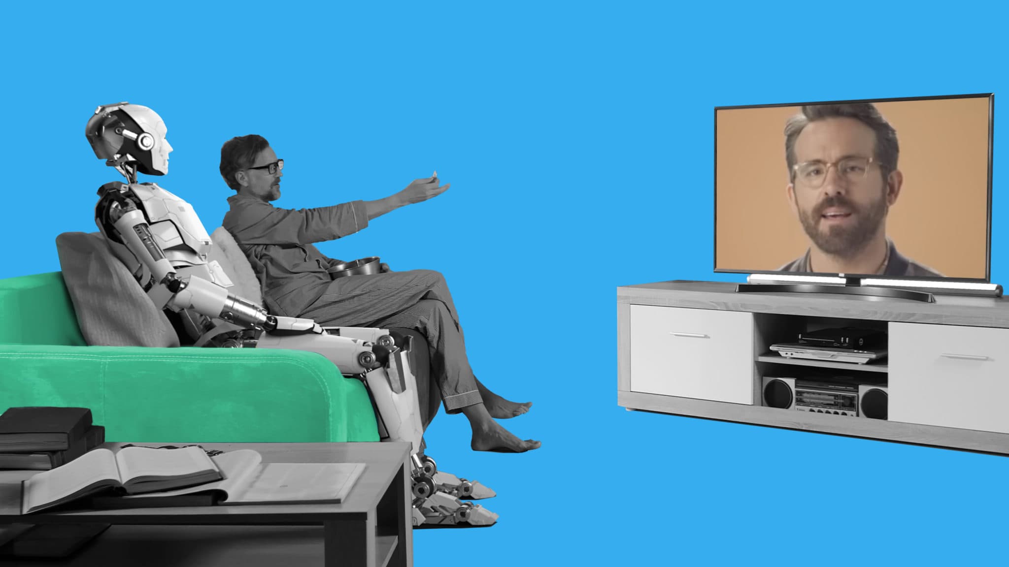 This is a photo with a blue background, the couch has a person sitting next to a robot. To the right, there is a TV screen with Ryan Reynolds talking on the screen. This photo is a clip from one of the videos in the video marketing examples blog.