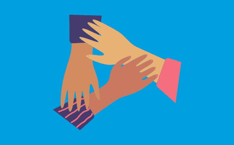 Hands of women of color holding each other